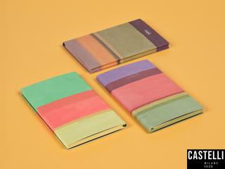Verschiedene Notizbücher von Castelli Milano in der Serie STRIPES in verschiedenen Größen mit Leineneinband.
