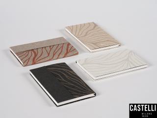 Verschiedene Notizbücher von Castelli Milano in der Serie WAVES. Notizbücher mit Premium Naturpapier, Größe A5.