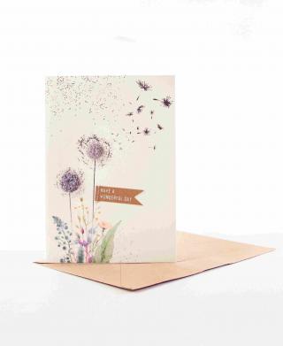 Karte mit Pompons und der Aufschrift 