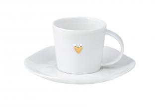 Kleine Tasse aus Keramik mit goldenem Herzen und Untertasse.