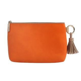 Kosmetiktasche in orange.