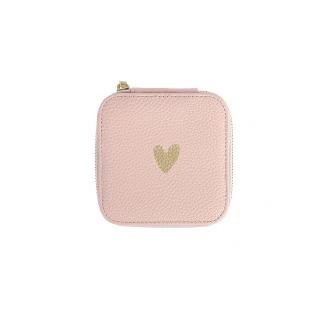 Schmuckbox in rosa mit einem kleinen goldenen Herzen.